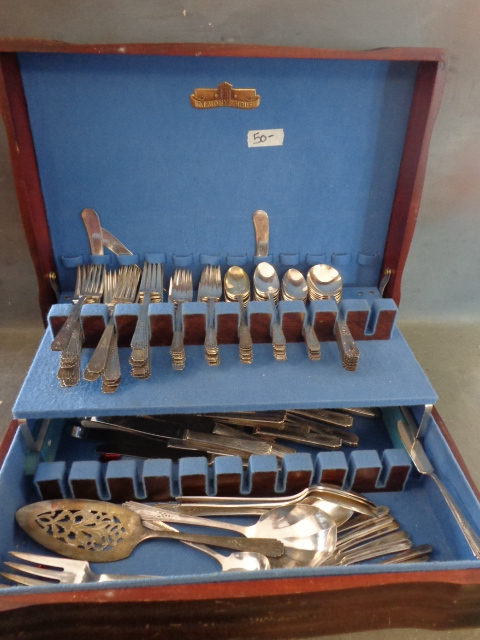 Silverware in Wood Chest
