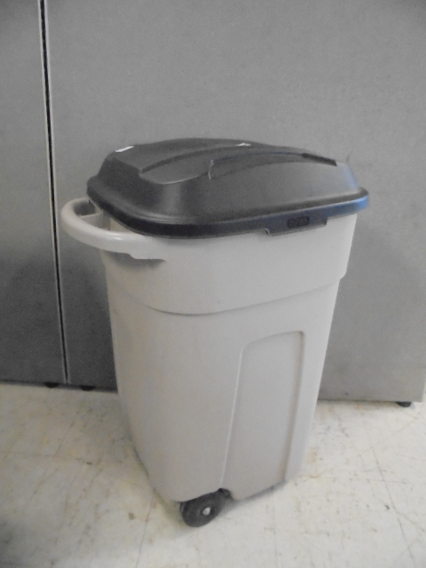 Trash Can and Garden Hoses