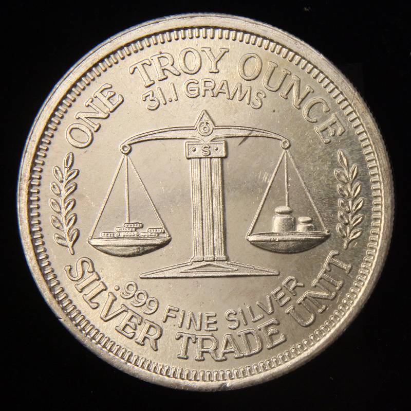 lot 32 image: 1 TROY OZ. .999 FINE SILVER MORGAN DOLLAR DESIGN