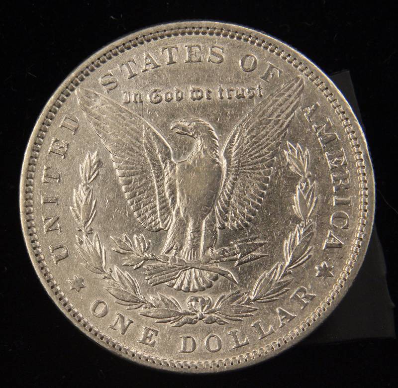 lot 44 image: 1884 MORGAN SILVER DOLLAR AU