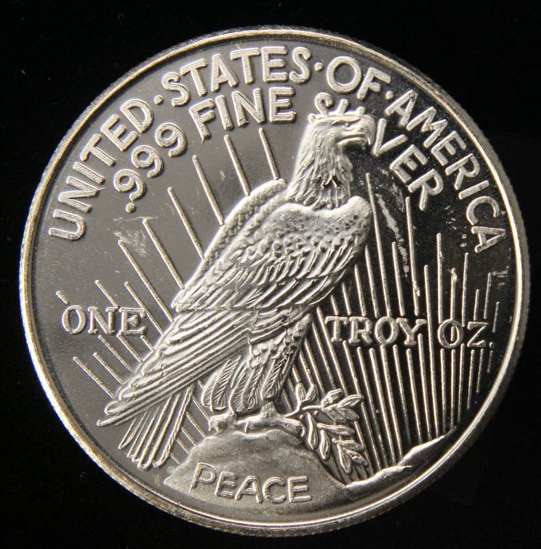 lot 88 image: 1 TROY OZ. .999 FINE SILVER PEACE DOLLAR DESIGN