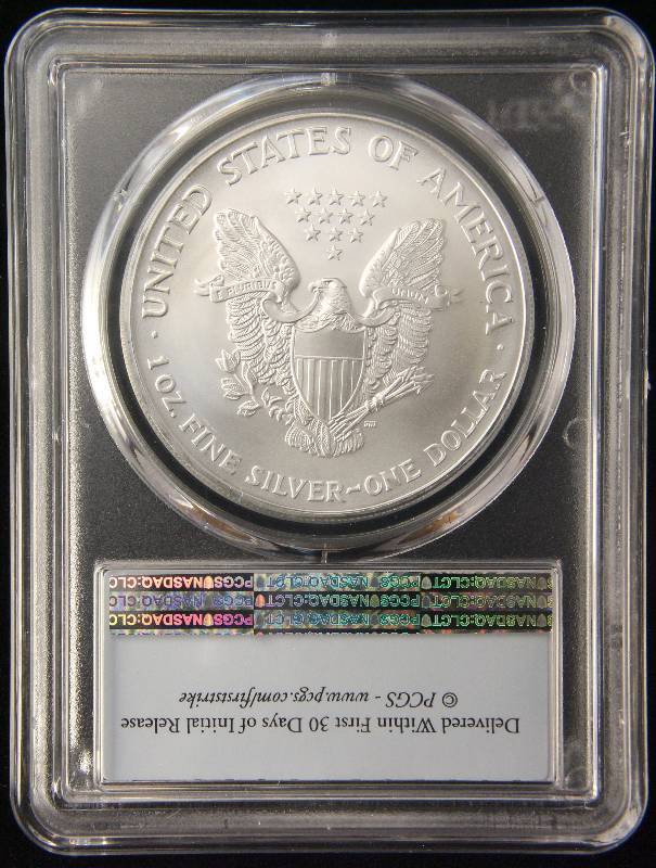 lot 90 image: 2003 AMERICAN SILVER EAGLE 1 TROY OZ. .999 FINE MS69 PCGS FIRST STRIKE