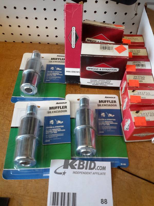 lot 88 image: Lot of small engine mufflers and muffler parts