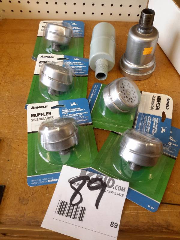 lot 89 image: Lot of small engine mufflers and muffler parts