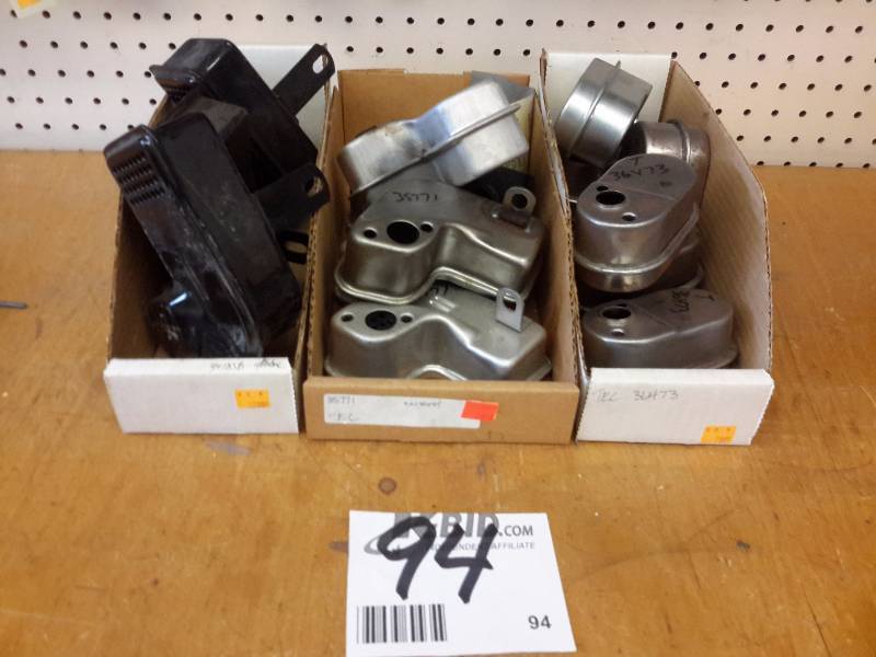 lot 94 image: Lot of small engine air cleaners as shown