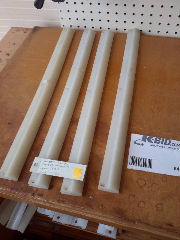 lot 64 image: 4 Snow Blower Scrapers.. See tag for specs