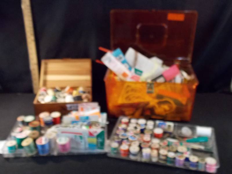 Sewing Kit and lots of extra thread and zippers, needels and much more