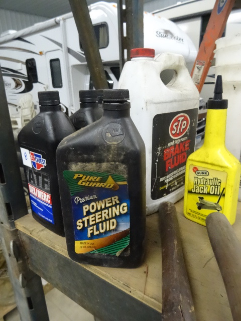 lot 8 image: 5 bottles of ATF. Misc auto fluids....