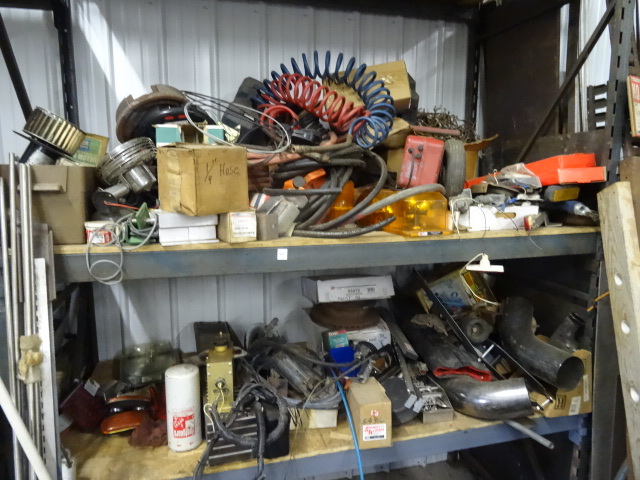 lot 33 image: 2 shelves of misc related parts. Tr...