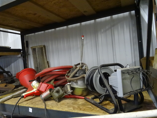 lot 34 image: Misc truck parts. Portable halogen ...