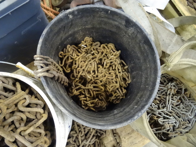 lot 44 image: Large lot of misc tire chains. Look...