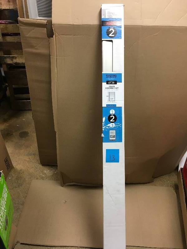 lot 13 image: Delta 27 in. to 36 in. Semi-Frameless Contemporary Pivot Shower Door Track Assembley Kit in Nickel New