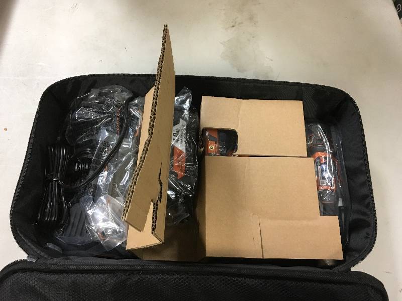 lot 45 image: Ridgid 18 Volt Impact Wrench Kit open box never used