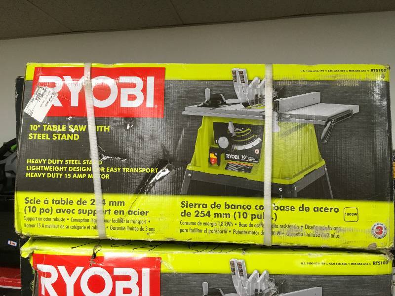 lot 55 image: Ryobi 10 Table Saw with Steel Stand  New
