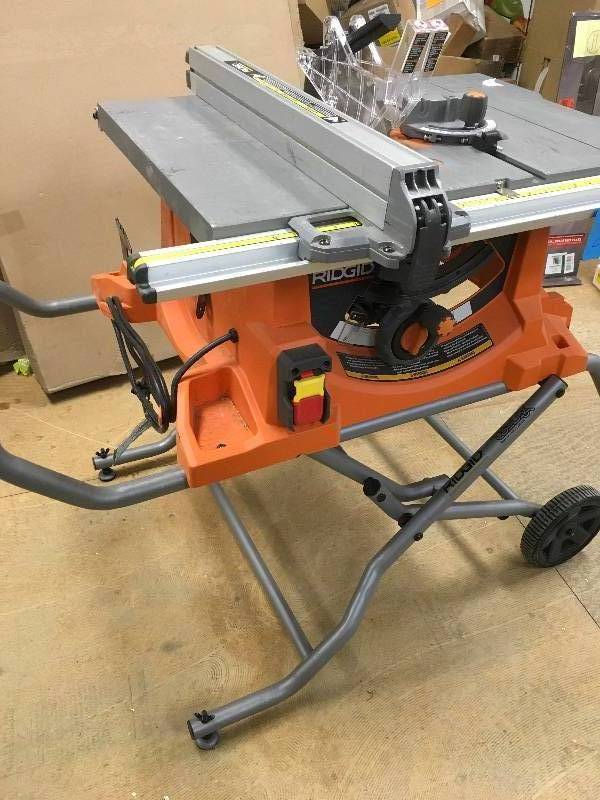 lot 81 image: RIDGID 15 Amp 10 in. Heavy-Duty Portable Table Saw with Stand Model#  R4513  in working conditions
