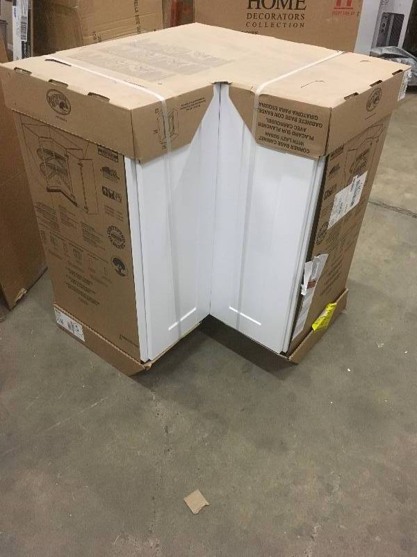 lot 28 image: Hampton Bay 2487091 RSI Home Products Shaker Corner Base Cabinet with Lazy Susan - White open  box never used