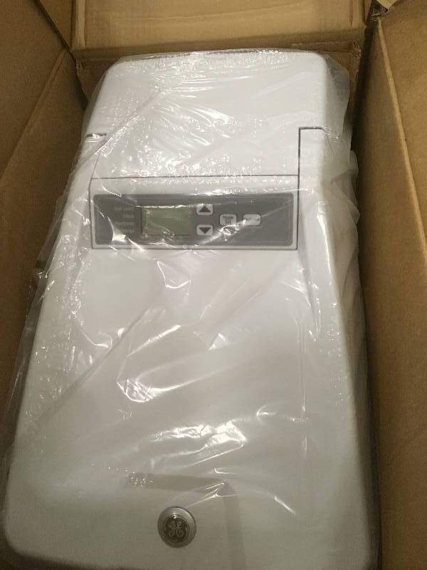 lot 57 image: GE GXSF30V 30, 400 Grain Water Softener open  box never used