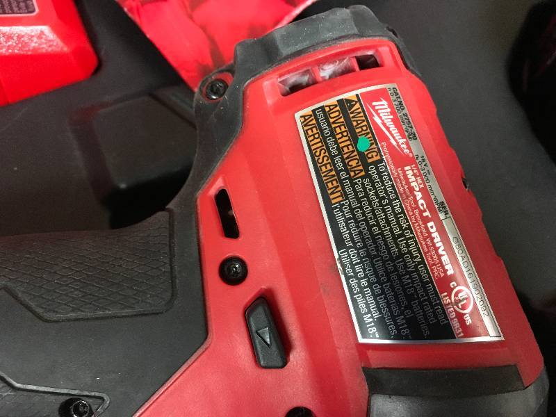 Milwaukee M18 Hammer Drill & Impact Driver Kit 18 Volt in working conditions
