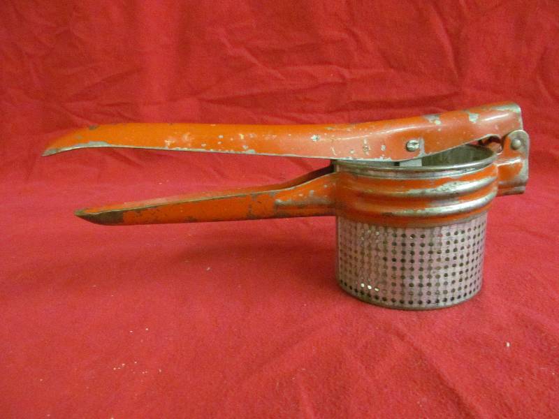 lot 51 image: vintage potato ricer