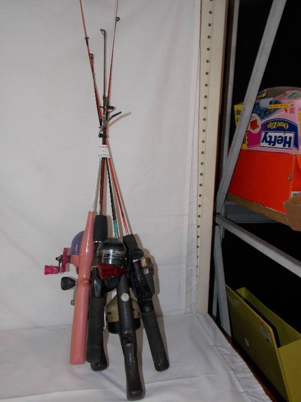 lot 57 image: Bundle of various  ice fishing poles