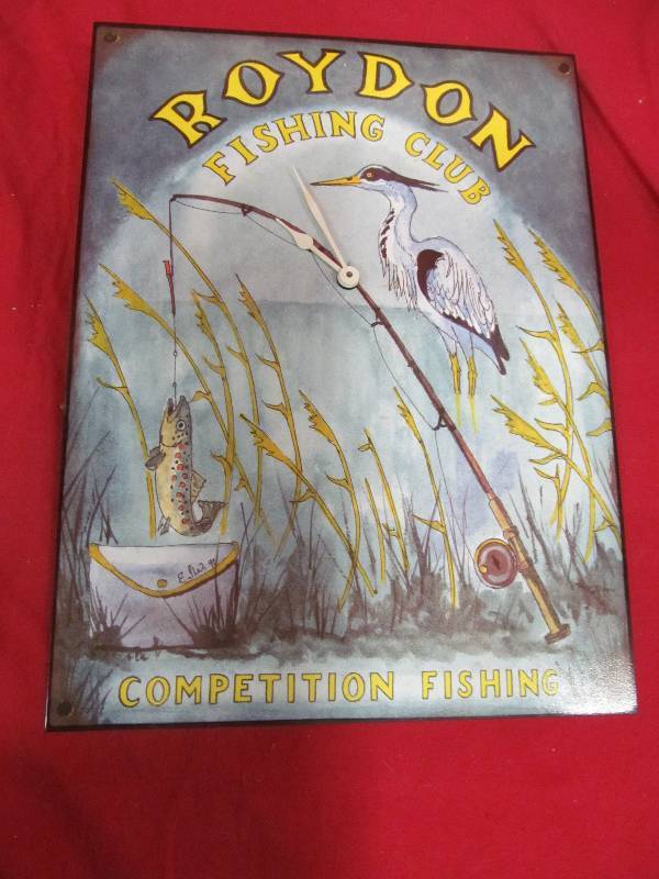 lot 20 image: tin sign clock