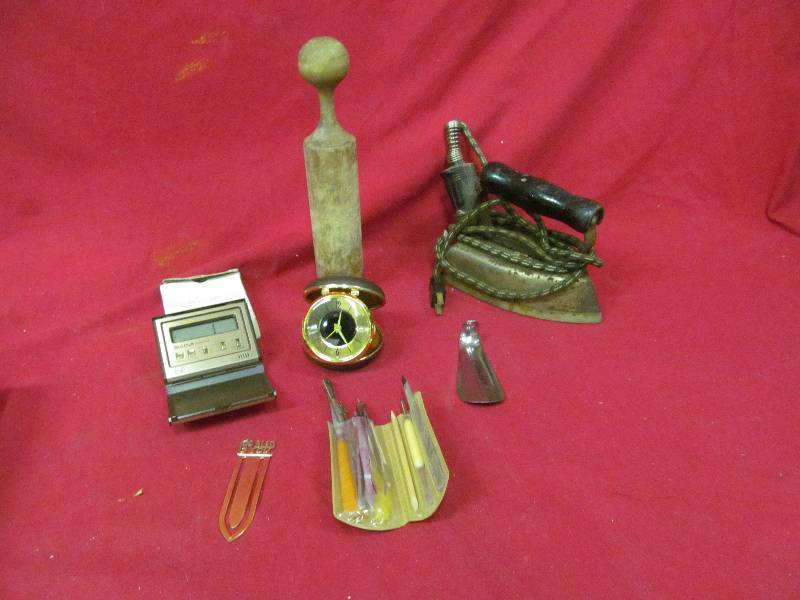 lot 50 image: vintage manicure set, iron, wood roller, alarm clock
