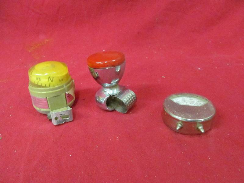 lot 75 image: vintage auto compass, steering knob, amp meter