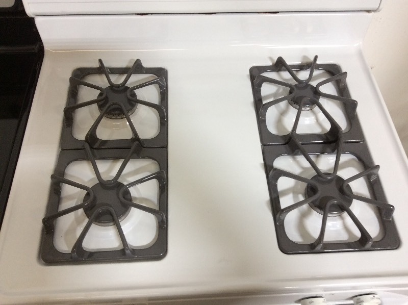 lot 64 image: Whirlpool White 4 Burner Gas Stove