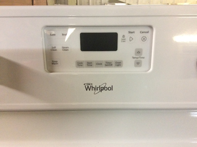 lot 18A image: Whirlpool White Glass Top Electric Stove
