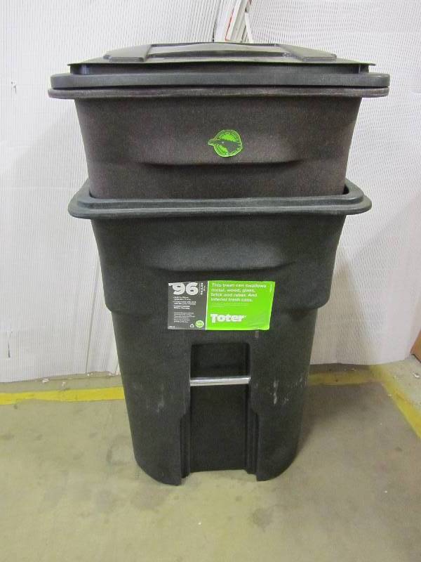 lot 20 image: Toter 96 Gal Wheeled Blackstone Trash Can Toter 96 Gal. Green Wheeled Trash Can