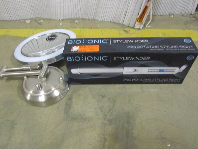 lot 47 image: Bio Ionic StyleWinder 1 Inch Nano-Ceramic Rotating Styling Iron Zadro Surround Lighted Hardwired 15 in. L x 9.5 in. W Wall Mirror in Satin Nickel