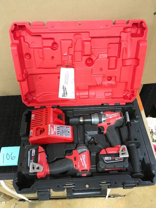 Milwaukee M18 Hammer Drill & Impact Driver Kit In like New working conditions
