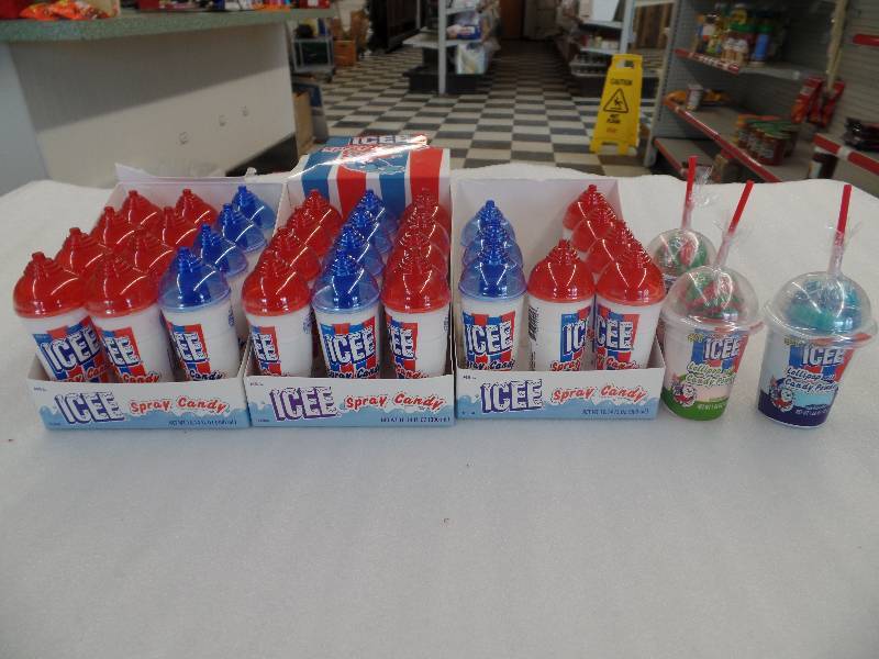 lot 96 image: ICEE Spray Candy & Lollipop w Candy Powder