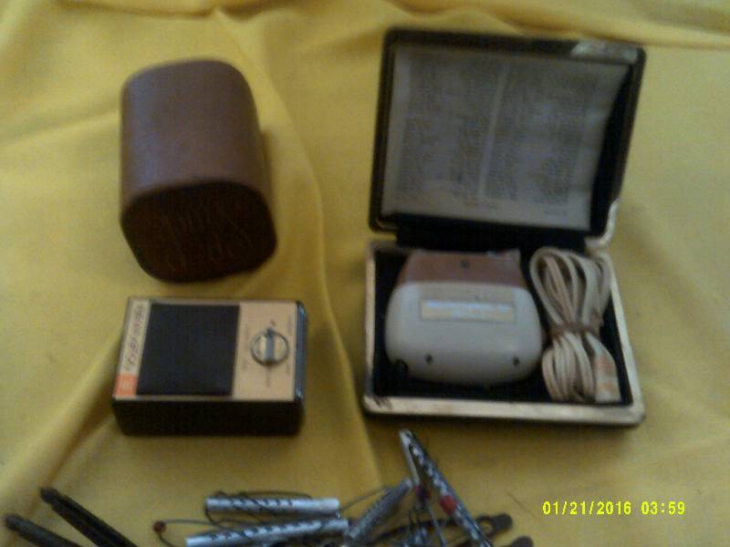 lot 13 image: 2 VINTAGE SHAVERS AND METAL CURLERS