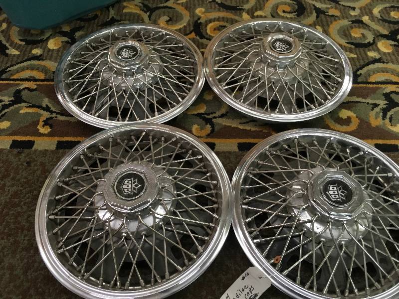 SET OF 4 CADILLAC HUBCAPS
