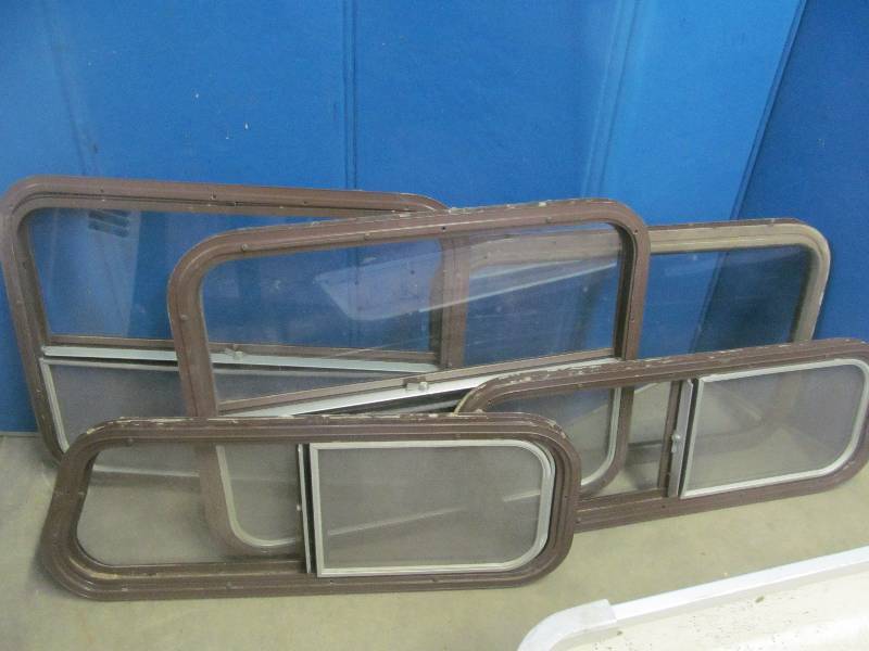 lot 59 image: framed aluminum windows