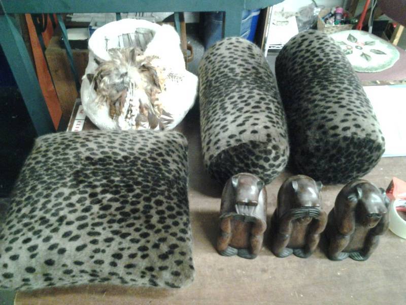 lot 35 image: 3-Cheetah Throw Pillows, Indian Basket, Hear No Evil-See No Evil-Speak-No Evil Monkeys
