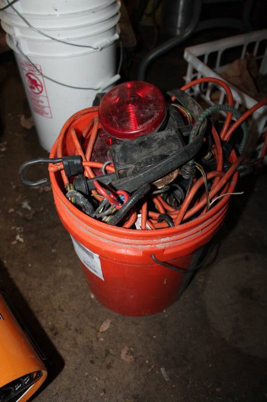 lot 24 image: Bucket Lot of Various Supplies includes Trailer Lights, Bungee Cords, Extension Cord and More