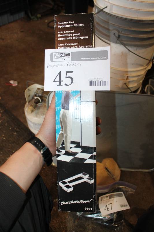 lot 45 image: Stamped Steel Appliance Rollers in the box