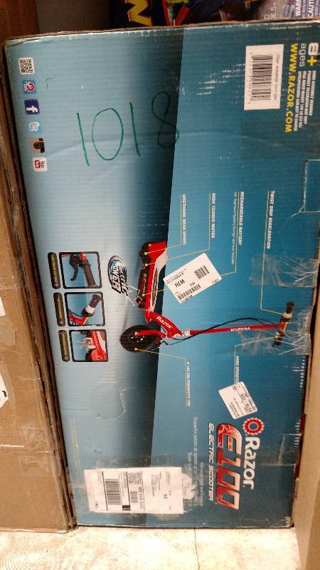 lot 1018 image: Razor E100 Electric Scooter-Red