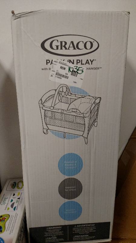 lot 1035 image: Graco Pack n Play with Bassinet and NapperChanger - Pink