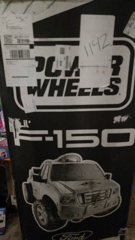 lot 1142 image: Power Wheels 6V Gray Ford F-150 Pickup Ride-On