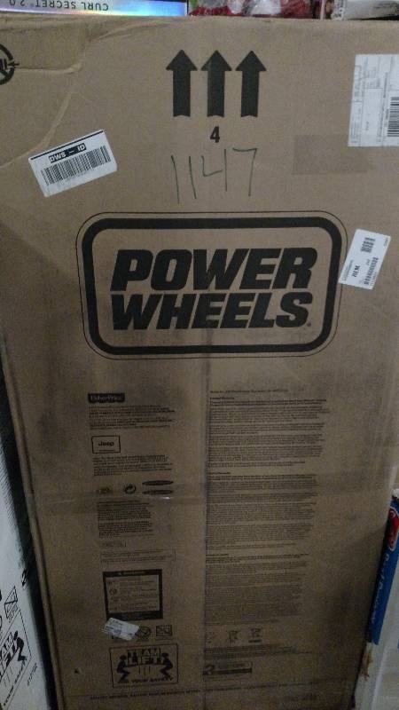 lot 1147 image: Power Wheels 12V Jeep Wrangler Ride-On