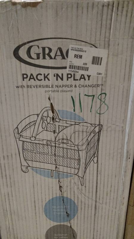 lot 1178 image: Graco Pack n Play with Bassinet and NapperChanger - Pink