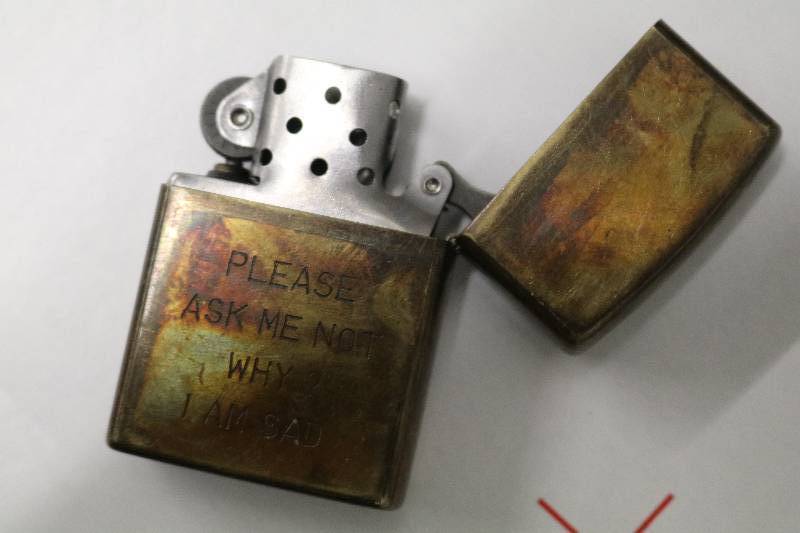 lot 22 image: Zippo Lighter Engraved Viet Nam Era
