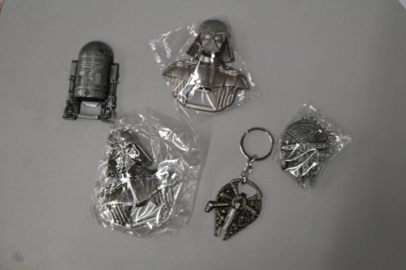 lot 23 image: Star Wars Bottle Openers