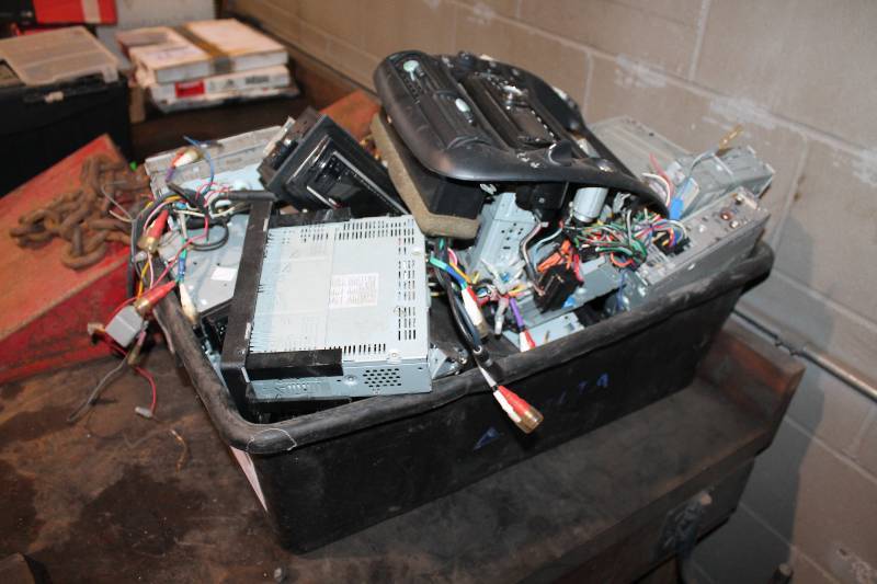 lot 18 image: Bin Lot of Misc Car Stereos - Pioneer, Alpine, And More