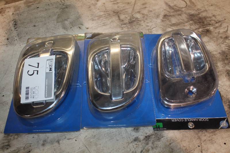 lot 75 image: United Pacific Door Handle Cover - Freightliner