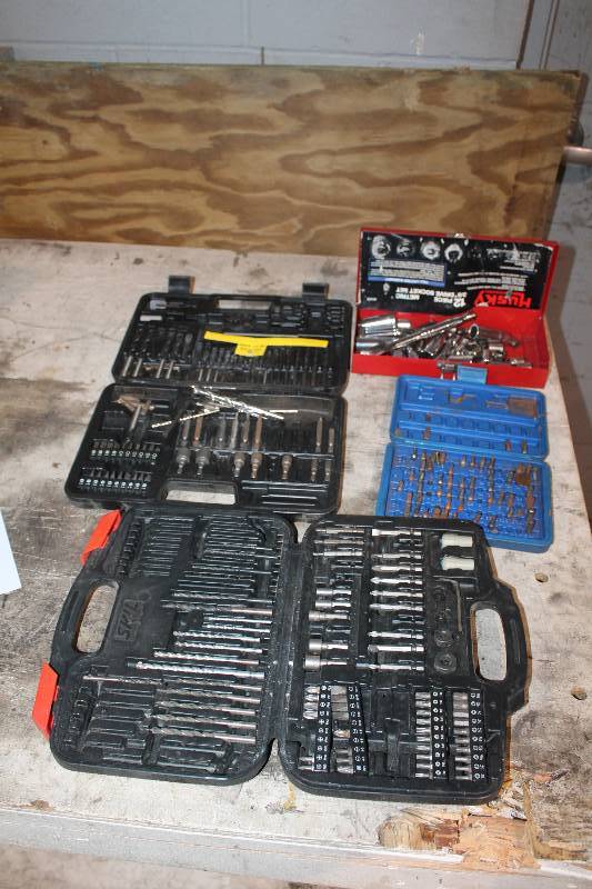lot 86 image: Lot of (4) Tool Box Kits - Skil SAE Drill Bit Set, Hex Key SAE, Black & Decker Drill Bit Driver Set, Husky 12-Piece 38in. Drive Socket Set Metric