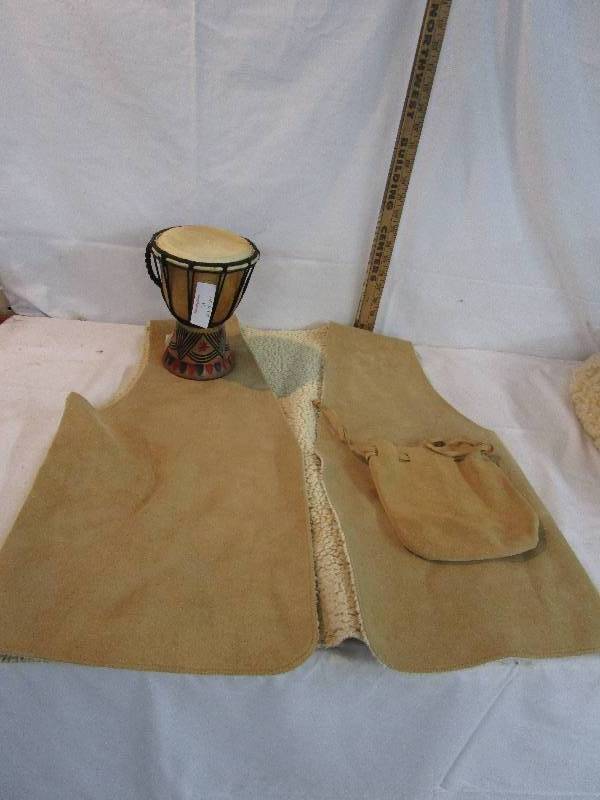 lot 34 image: Hand Drum, Leather Vest and Leather Pouch